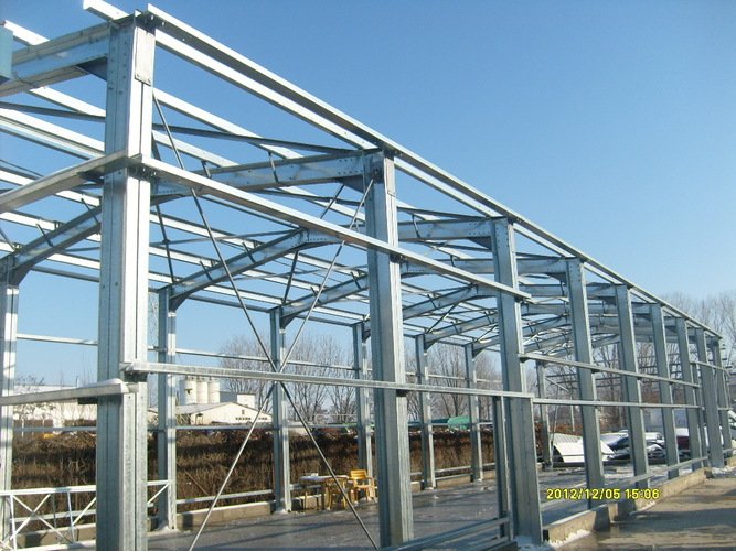 Rombuild Metal Solutions - Constructii hale metalice